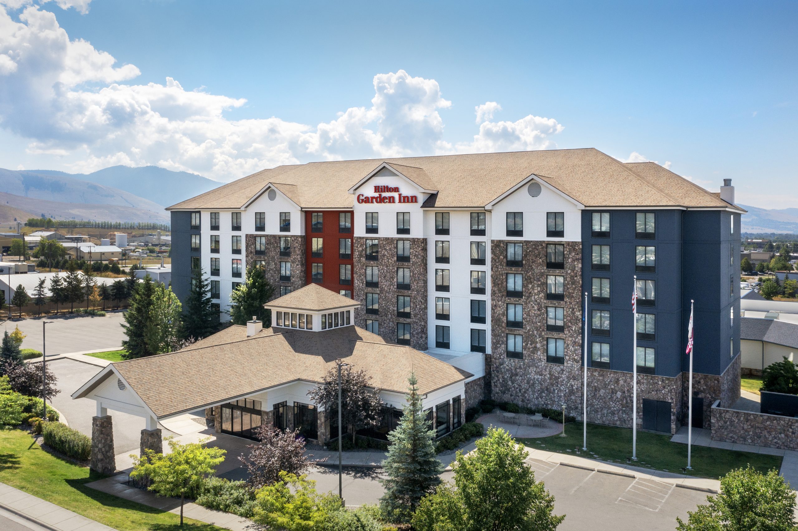 hotel exterior with mountains in background